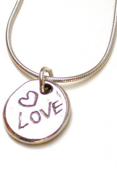 These make a great gift but they're so sweet you'll probably just want to keep it yourself, I know I would!<br /><br />£32, <a target="_blank" href="http://www.argentlondon.com/products/charms/silver-love-charm-pendant-token/">www.argentlondon.com</a><br />