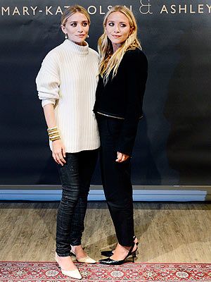 <p>It was a double fashion whammy for the Olsen twins as they took on Sweden yesterday. Mary-Kate and Ashley Olsen ozzed Scandi chic to launch their Bik Bok range in Stockholm - only fitting as it's the inspiration behind the collection. Ashley wore a cream boyfriend knit which she rolled up at the sleeves to reveal a statement cuff bracelet. She teamed it with black skinnies and cream kitten heels. Meanwhile, Mary-Kate opted for head-to-toe black with a knit with zip detailing, tapered trousers and chic sling-backs.</p>