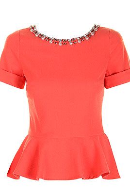 <p>Just because the sun isn't shining doesn't mean you can't add a pop of colour to your wardrobe. This peach peplum top with embellished neckline is flattering to any body shape and will lok great worn with jeans or a pencil skirt.</p>
<p>Jessica top, £55, <a href="http://www.darlingclothes.com/product/darling/jessica-top/7174/" target="_blank">Darling</a></p>