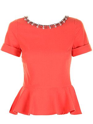 <p>Just because the sun isn't shining doesn't mean you can't add a pop of colour to your wardrobe. This peach peplum top with embellished neckline is flattering to any body shape and will lok great worn with jeans or a pencil skirt.</p>
<p>Jessica top, £55, <a href="http://www.darlingclothes.com/product/darling/jessica-top/7174/" target="_blank">Darling</a></p>