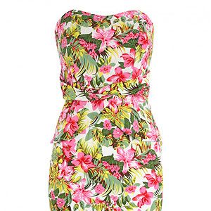 <p>Going on a romantic beach holiday with your man? Save yourself some suitcase space with a tropical or floral print day frock that doubles up as a going out dress too. Simply wear with tan sandals by day and wedges by night.</p>
<p>Ruby Rocks tropical floral peplum dress, £39, <a href="http://www.stylistpick.com/clothing/ruby-rocks-tropical-floral-peplum-dress-pink.html" target="_blank">Stylist Pick</a></p>
