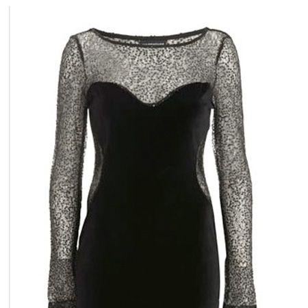 Velvet and lace combined makes this dress bang on trend to be a gothic princess<br /><br />£55, <a target="_blank" href="http://www.warehouse.co.uk/fcp/product/fashion/Gloss/-cut-out-sequin-and-lace-dress/13241">www.warehouse.co.uk</a><br /><br />