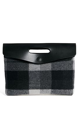 <p>This is the most subtle way to nod to next season's punk trend: A muted plaid combined with soft leather on an over-sized clutch.</p>
<p>Check clutch bag, £45, <a title="http://www.asos.com/Asos/Asos-Leather-And-Check-Oversized-Clutch-Bag/Prod/pgeproduct.aspx?iid=2989306&SearchRedirect=true&SearchQuery=check%20clutch" href="http://www.asos.com/Asos/Asos-Leather-And-Check-Oversized-Clutch-Bag/Prod/pgeproduct.aspx?iid=2989306&SearchRedirect=true&SearchQuery=check%20clutch" target="_blank">ASOS</a></p>