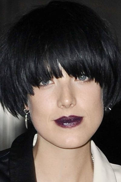The trend receptive star wears a deep purple lip stain and lends some glamour to the gothic trend