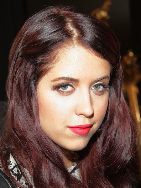 Peaches took the trend to her tresses, sporting a rich plum hair hue