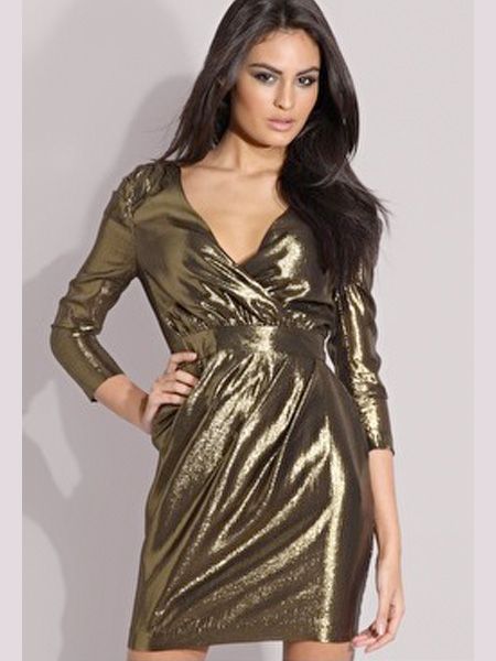 Sooo 80's but so blooming cool! Cause some chaos on the dancefloor in this little number<br /><br />£65, <a target="_blank" href="http://www.asos.com/Asos/Asos-Premium-Gold-Silk-Shoulder-Detail-Dress/Prod/pgeproduct.aspx?iid=784861&cid=8857&sh=0&pge=0&pgesize=20&sort=-1&clr=Gold#at">www.asos.com</a><br />