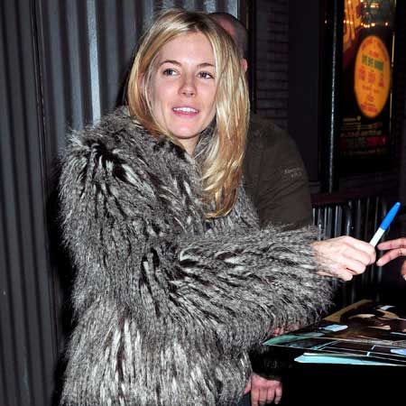 Sienna Miller, bare faced but still beautiful, was wrapped up warm in a faux (we're hoping!) fox fur coat in New York after her stage performance in 'After Miss Julie' in New York.