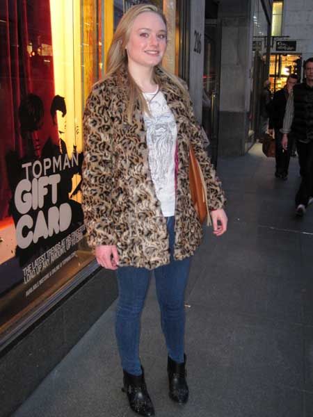 <p> </p><p><em>Coat, River Island</em><br /><br />We love how she's teamed her faux fur coat with skinny denim, studded biker boots and fringe bag...all our fav trends in one fab look!<br /><br /></p>