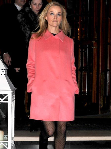 Reese Witherspoon was pretty in pink as she left her hotel in London. The Hollywood actress is currently over in the UK for a press conference in the Commons calling for more Government help for victims of domestic violence.<br /><br />