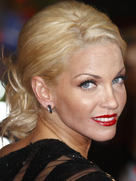 <p>Red lippy may be hard to wear but with the right complexion-complimenting tones and a bucket of confidence, these stars show it's worth the risk</p>  

<p><em>Left:</em> Sarah Harding's cherry red lips inject her look with grown-up glam </p>