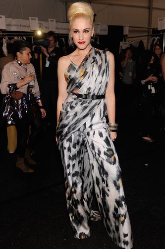 <p>In her role as designer Gwen showcased her fall L.A.M.B. collection and was the star of the show in a slinky animal print jumpsuit. Loving that fat bun too!</p>