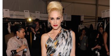 <p>In her role as designer Gwen showcased her fall L.A.M.B. collection and was the star of the show in a slinky animal print jumpsuit. Loving that fat bun too!</p>