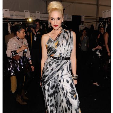 <p>In her role as designer Gwen showcased her fall L.A.M.B. collection and was the star of the show in a slinky animal print jumpsuit. Loving that fat bun too!</p>