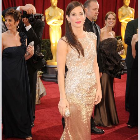 Sandra was crowned Best Actress and perhaps Best Dressed in this sparkling champagne Marchesa number