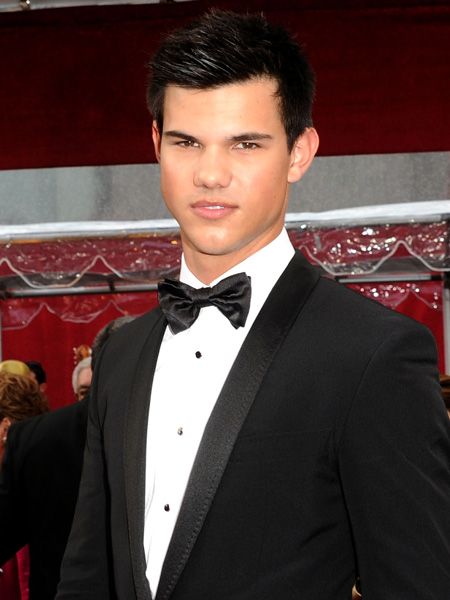 To think, a year ago there was no Taylor in our lives and now we're blessed with seeing the beauty in a tux  <br />