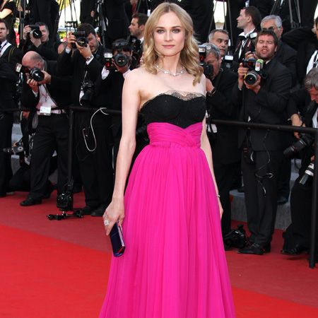<p>Diane attended the closing ceremony wearing a black and fuchsia pink Jason Wu gown that clashed spectacularly with the red carpet </p>