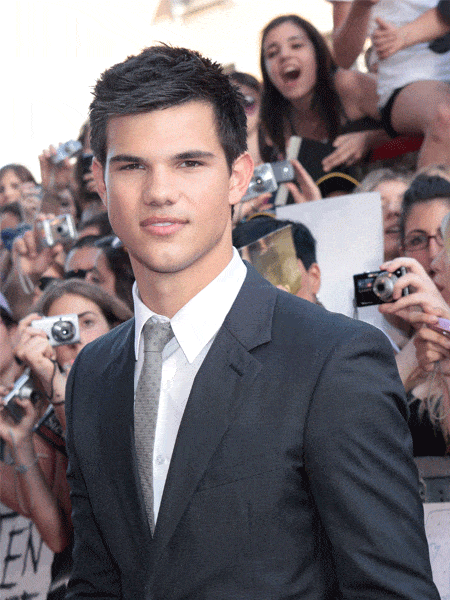Taylor Lautner's fresh faced, clean-cut and, with those beautiful dark looks, has us howling for more screen time with his on-screen alter-ego, Jacob Black <br />