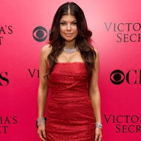 Fergie rocked a tight, bright jammy red gown at the Victoria's Secret Fashion Show last year... we love how she kept her accessories simple and let her chocolate locks do the talking!<br />
