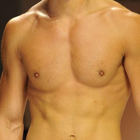 <p>This pair of pecs has had plenty of time on the catwalk and in front of the lens - and we say they deserve every second of attention, but which male model do they belong to? </p>