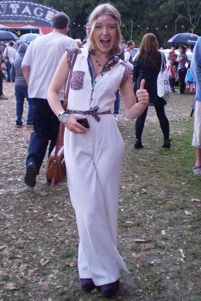Lena goes all 70s rocking a Beyond Retro jumpsuit with purple Office wedge boots and a H&M headband at Vintage at Goodwood festival