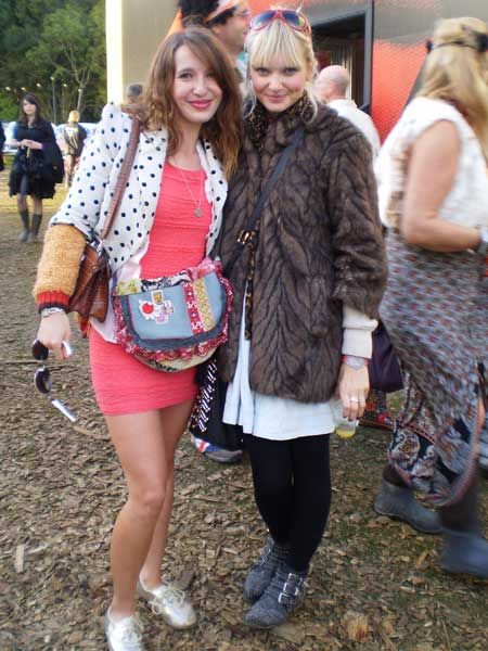 Mercedes, (right) wears Topshop dress, Miss Selfridge jacket and a cardie made by her nan. Estelle, (left) wears a French Connection dress under at River Island faux fur coat at Vintage at Goodwood