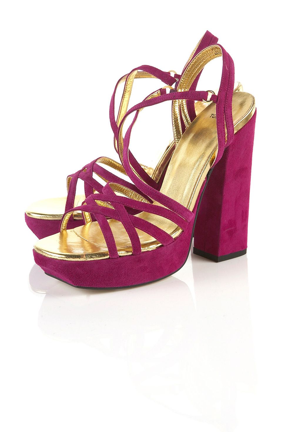 <p>Block heels are the shoe shape du jour and these suede magenta puppies are the pair to wear with denim, dresses and well... everything!</p>

<p>£70,<a href="http://www.topshop.com/webapp/wcs/stores/servlet/ProductDisplay?beginIndex=0&viewAllFlag=&catalogId=33057&storeId=12556&productId=1876873&langId=-1&categoryId=&parent_category_rn="> topshop.com </a></p>