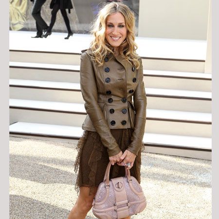 <p>Every girls's fave fashionista posed outside the Burberry Prorsum show before she took her front row seat next to Serena Williams and Alexa Chung. She wore a brown Burberry outfit with and Alexander McQueen handbag and strappy sandals by her current fave footwear designer, Nicholas Kirkwood</p>