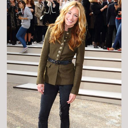 <p>A similarly glossy Cat Deeley also attended the Burberry show oozing effortless elegance in one of the label's AW military jackets with skinny jeans and ankle boots</p>