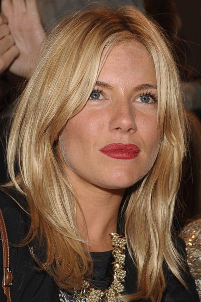 Sienna Miller's soft buttery-blonde locks have been allowed to fall loose around her face, giving her that effortless 'oh so sexy' vibe we all crave! A definite head-turner at the Matthew Williamson Collection