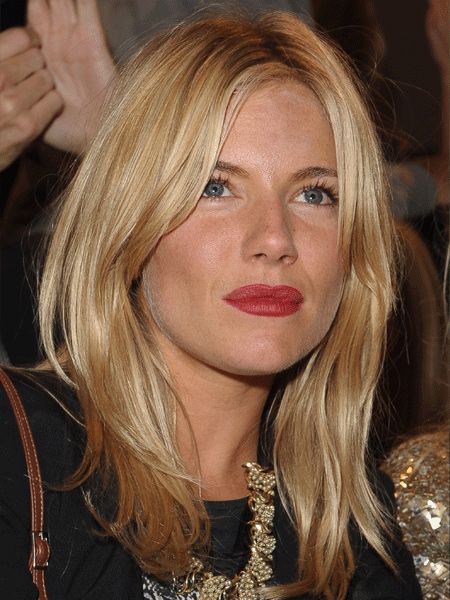 Sienna Miller's soft buttery-blonde locks have been allowed to fall loose around her face, giving her that effortless 'oh so sexy' vibe we all crave! A definite head-turner at the Matthew Williamson Collection