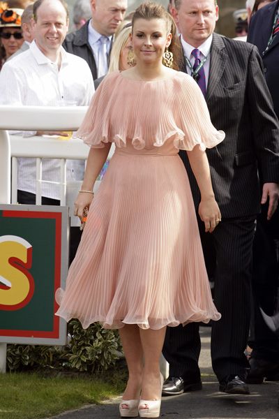 <p>Looking pretty in pink, Coleen did Ladies' Day at the races wearing a floaty frock that was girlie and glam in equal measure</p>

