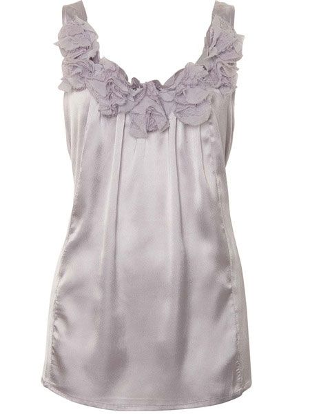 <p>Sheer tones are packing a  punch on high street right now, the colour and the neck frill detail on      this vest is a sure fire winner</p>

<p>£25<a target="_blank" href="http://www.awear.com/going-out-tops/rosette-cami/invt/10301410silver&setlocn=restofworld&log=4?siteID=0RpXOIXA500-BHAsQLCacc71ydKyxdxBqQ&cmpid=linkshare">, awear.com</a></p>