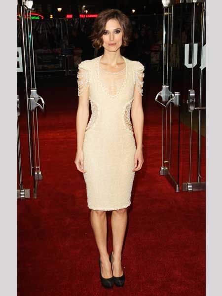 Keira glammed up for the UK premiere of Never Let Me Go wearing an elegant pearl beaded Chanel dress with black satin and wood platform shoes. Is this the best you've seen the star look for ages?  <br />