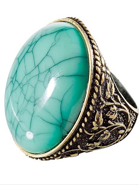 <p>This fierce ring is the perfect stocking filler or secret santa find for girls who like their accessories. The mint green stone and gold detailing will fool friends into thinking this is a vintage shop find</p><p><br /><br />£3.99, <a target="_blank" href="http://shop.hm.com/gb/shoppingwindow?dept=DAM_ACC_SMY&shoptype=S">hm.com</a><br />  </p>