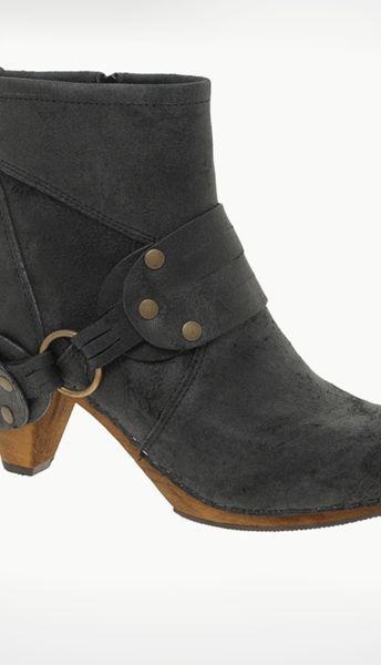 These suede boots are both biker babe and clog-tastic and look great teamed with a pair of skinny jeans. The distressed fabric will make your friends think they are a rare vintage find and with 60 per cent off they are an absolute bargain<p><br />now £50, was £99.99, <a target="_blank" href="http://www.asos.com/Sanita/Sanita-Buckle-Ankle-Clogs/Prod/pgeproduct.aspx?iid=1144403&cid=1931&sh=0&pge=0&pgesize=20&sort=-1&clr=Black">asos.com</a></p><br />