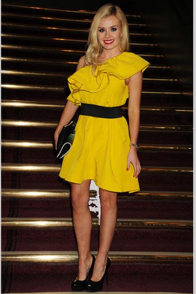 <p>At the opening of the Cirque du Soleil Totem show, Katherine Jenkins decided to brighten up the grey London skyline in a buttercup yellow one shoulder dress by Lanvin for H&M. With some fabulous frills drawing attention to the asymmetric neckline this number is pure sunshine</p>