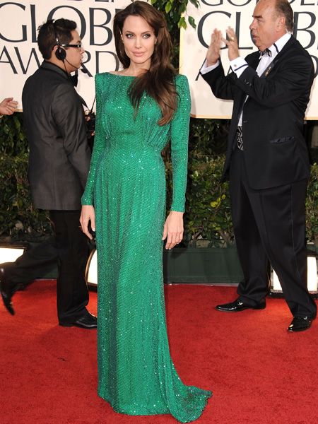 <p>Angelina also opted for shimmer in a Swarovski crystal-coated green gown by Versace that flashed little flesh </p>