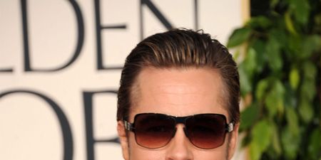A suave Mr Pitt graces the red carpet at the Golden Globes looking every inch the superstar