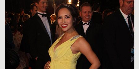 Beaming with her baby bump Myleene was all smiles as she took to the red carpet in a stunning pale yellow floor-length gown. Accessorising with bright red lips and nails the M&S model was certainly working the yummy mummy look