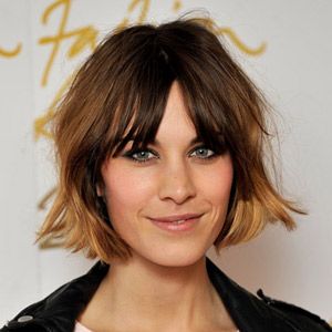 <p>Rarely seen without one, Alexa accessorises her centre parting with a short shaggy bob and feathered fringe</p>
