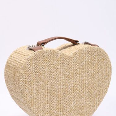 <p>We <i>heart</i> this vanity case - It's not only perfect for picnics, but splendid for shopping trips too. We can imagine a certain Miss Chung snapping this one up!</p>
<p>Straw heart box bag, £38, <a href="http://www.urbanoutfitters.co.uk/straw-heart-vanity-case/invt/5771463412323/&bklist=icat,5,shop,womens,womensaccessories,wbags" target="blank">urbanoutfitters.co.uk</a></p>