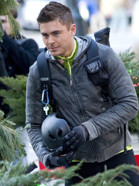 No, Zac Efron hasn't changed his profession to live the modest life of a bike messenger. The Hollywood hottie was just dressed like that for his role in film, New Year's Eve, in New York. The actor appears alongside Katherine Heigl, Halle Berry and Michelle Pfeiffer.
