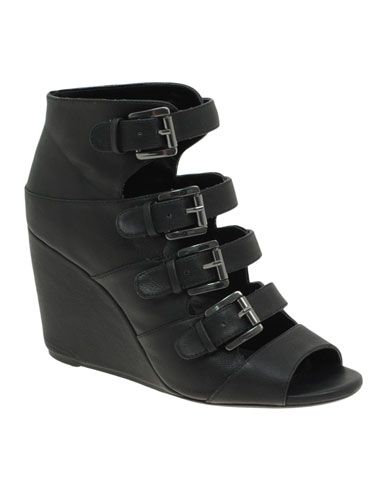 <p>With opaque tights or bare feet, these black sandals are modern classics. Wear with denim cut-offs and a slouchy tee for a look that oozes casual cool</p>

<p>£40, <a href="http://www.asos.com/Asos/Asos-Randal-Buckle-Wedges/Prod/pgeproduct.aspx?iid=950667&cid=4172&Rf-800=-1,50.000&sh=0&pge=6&pgesize=20&sort=-1&clr=Black" target="blank">asos.com</a></p>