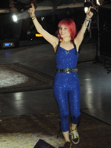 <p>Punk princess Hayley dressed down this eye-catching glitzy jumpsuit with a leather belt and a pair of trusty trainers</p>