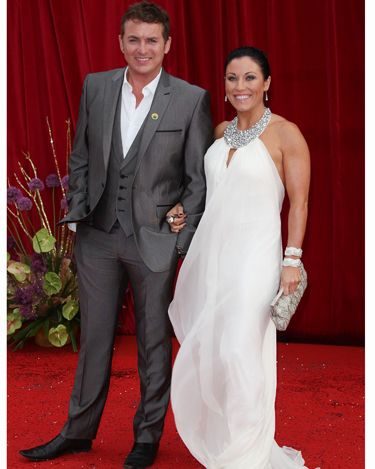<p>Jessie Wallace went for a Grecian look in her flowing white frock by Tarvydas. Very pretty, but we wish she'd lose the hoops!</p>


