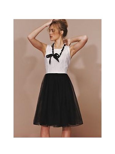 <p>This ballerina inspired prom frock is just perfect. We love the monochrome colour contrast. Soft but dramatic... we like that!</p>
<br/>
£39, <a href="http://www.very.co.uk/love-label-lace-tutu-dress/900276576.prd?browseToken=%2fb%2f1655%2fs%2fbestsellers%2c0%2fo%2f2%2fr%2f100&trail=1589-1655&prdToken=/p/prod7521228-sku12008978&aff=awin&affsrc=79682&cm_mmc=awin-_-79682-_-Content-_-0_0&awc=3090_1305303855_6e3564ee6ddc0dce9f12df641c9b7fa3"target="_blank">very.co.uk</a>
