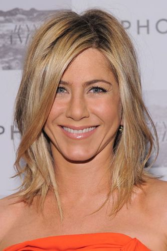<p>Forever leading the way in celebrity hairstyle trends, when Jen An had her hair quite literally 'lobbed off', hairdressers around the world went on high alert. Now one of the most requested cuts of the summer, her relaxed way of wearing it, complete with off-centre parting gives it a tousled beachy twist</p>