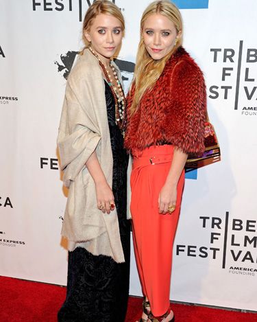<p>There is much controversy surrounding Mary-Kate Olsen's layered looks, however there is no doubt that these bright orange trousers are essential to the colour trend. She balances the brightness of the trousers with a fabulous redish feathered jacket and simple black strapped shoes, mastering the look</p>