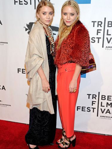 <p>There is much controversy surrounding Mary-Kate Olsen's layered looks, however there is no doubt that these bright orange trousers are essential to the colour trend. She balances the brightness of the trousers with a fabulous redish feathered jacket and simple black strapped shoes, mastering the look</p>