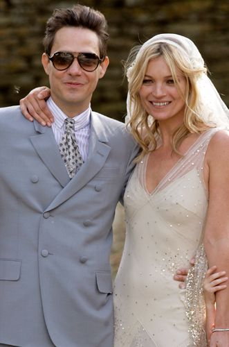 Kate Moss married Jamie Hince in a vintage-esque cream wedding dress by designer pal John Galliano. Her groom wore a Yves Saint Laurent suit. Following her nuptials, Kate posed to perfection for the awaiting paps